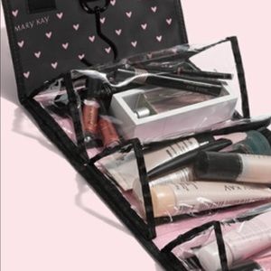 Mystery gifts included/Mary Kay travel roll up bag
